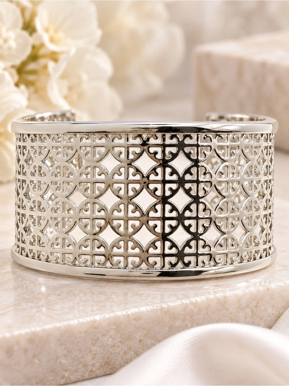 Tory Burch Miller logo cuff bracelet in silver.